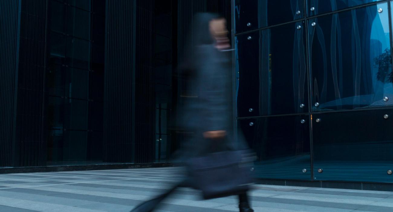 Business women walking into office building